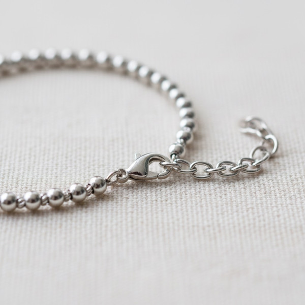 Kinderarmband mit Verlängerungskette, Verschluss im äußeren Glied eingehakt